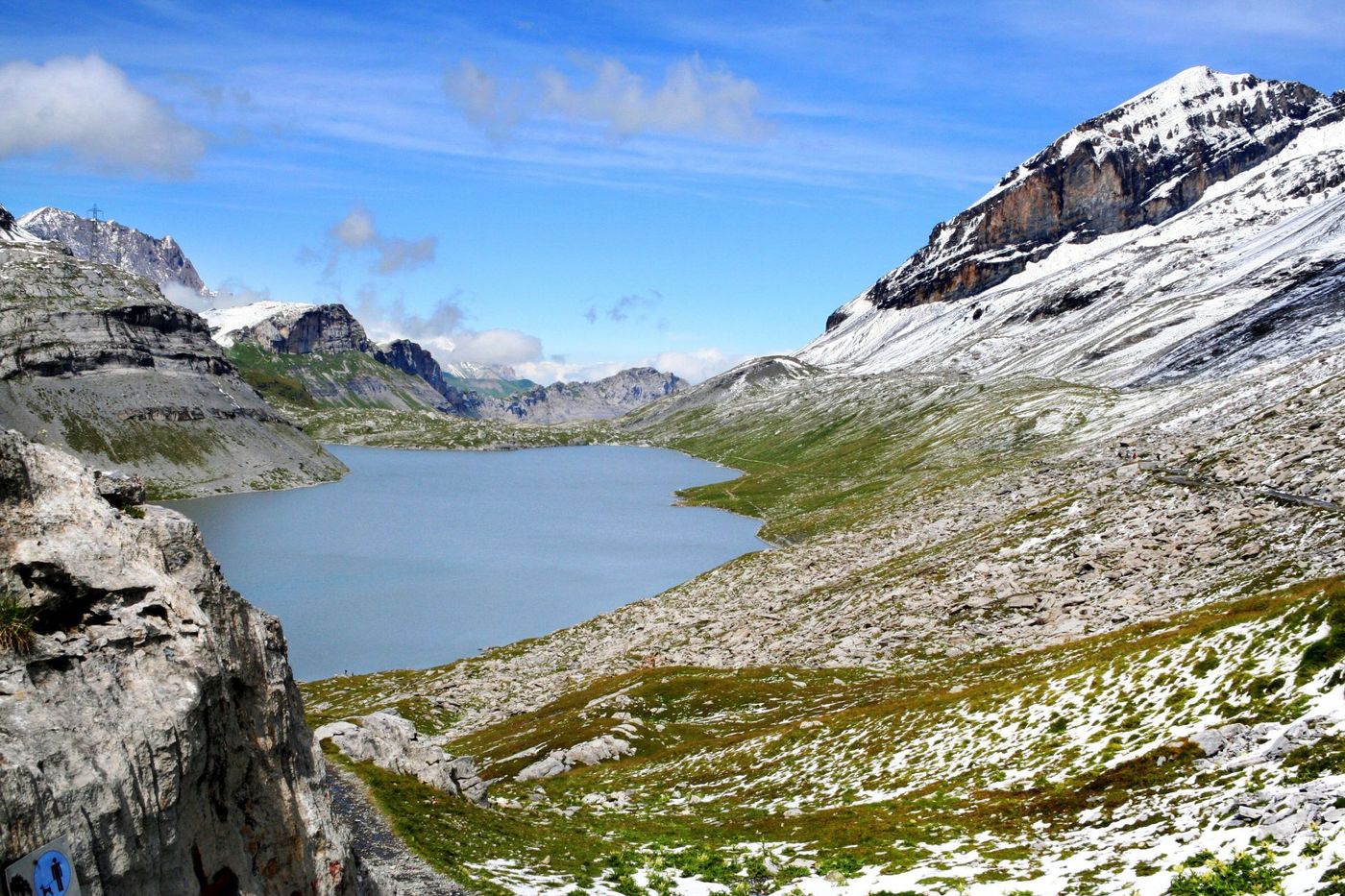 High-alpine waters of Lake Daubensee nestled near the Gemmi Pass in Leukerbad, Switzerland.