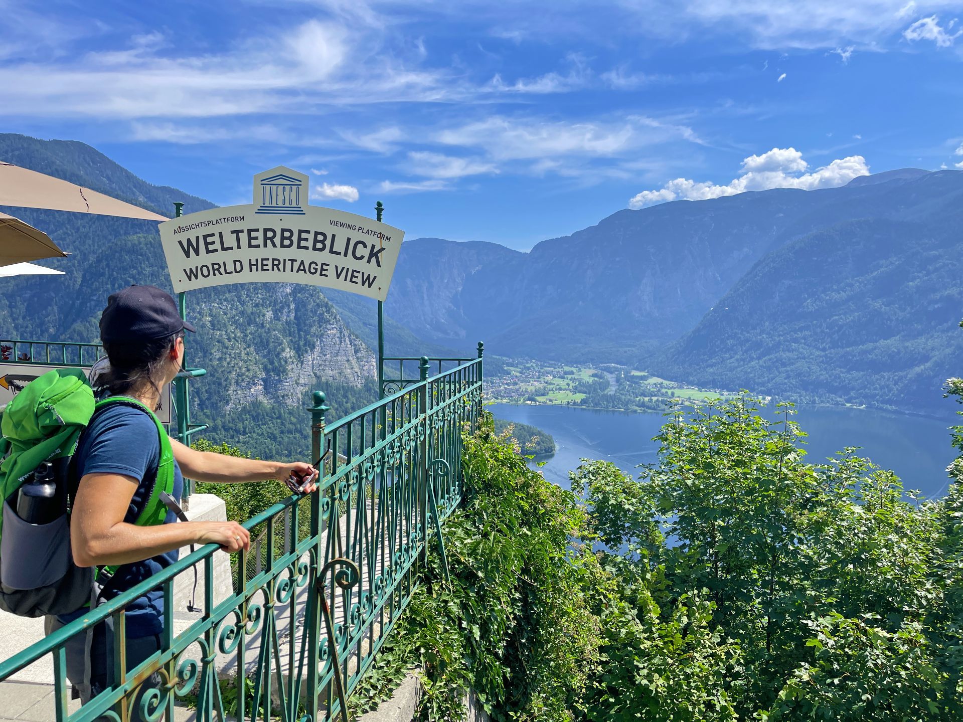 Hiker overlooking Hallstatt and the vast lake from the Skywalk Welterbeblick - supplied by Eurohike
