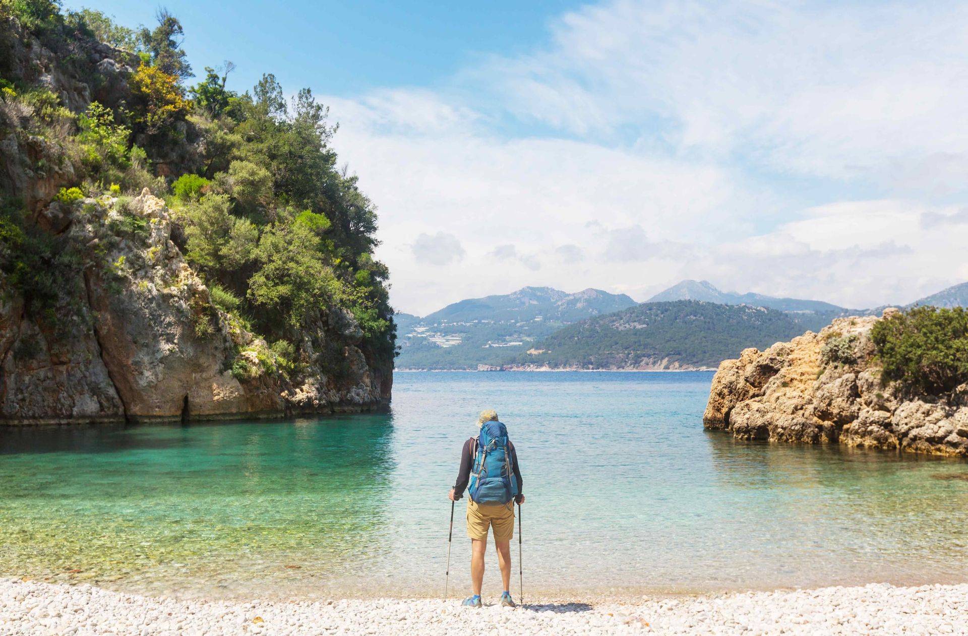 Man on beach walking Lycian way
